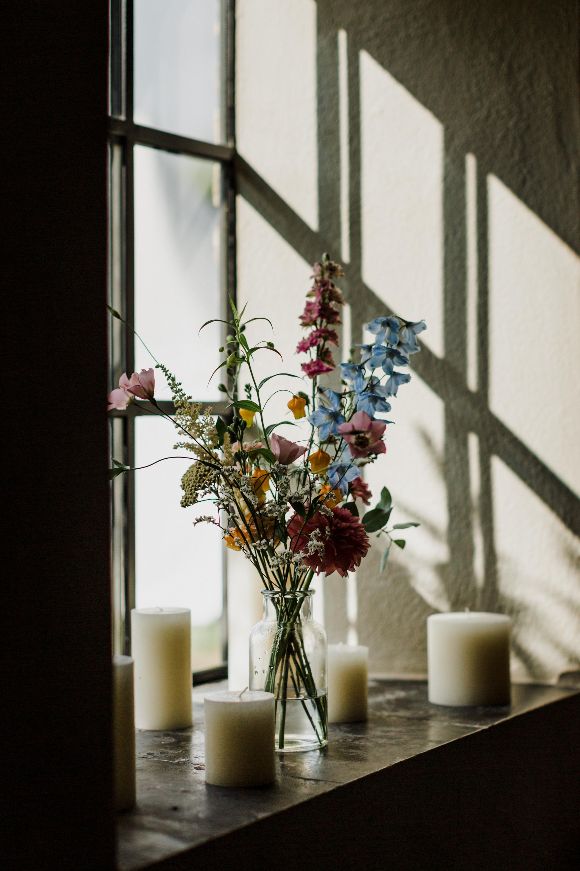 colourful flowers in vases