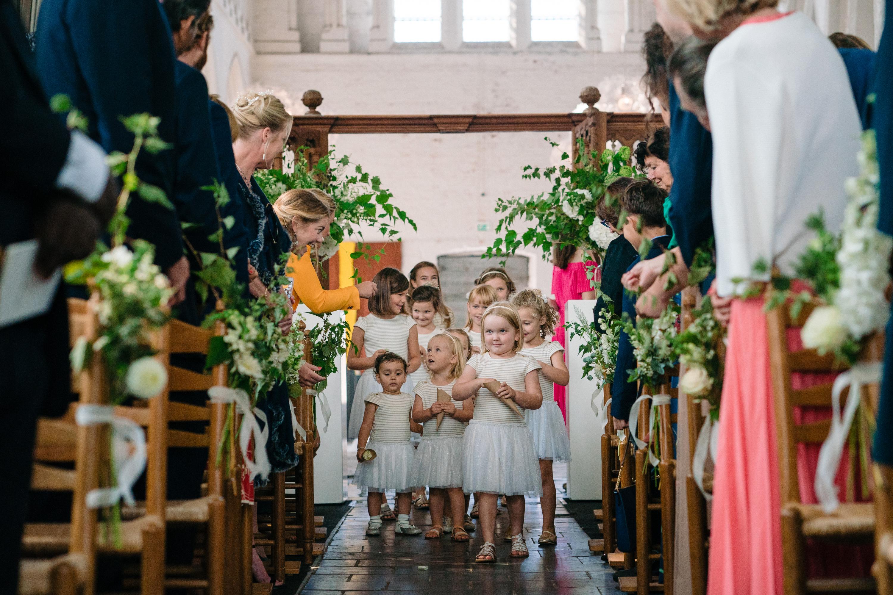 bridesmaids entering the church